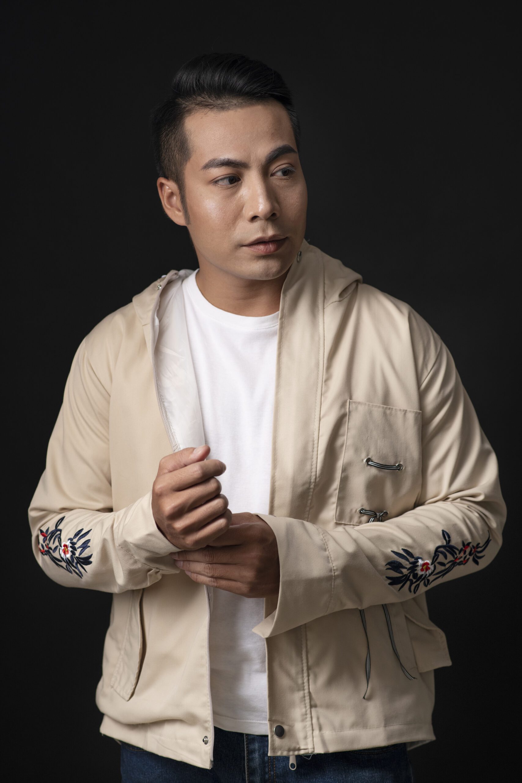 portrait-young-man-wearing-embroidered-shirt